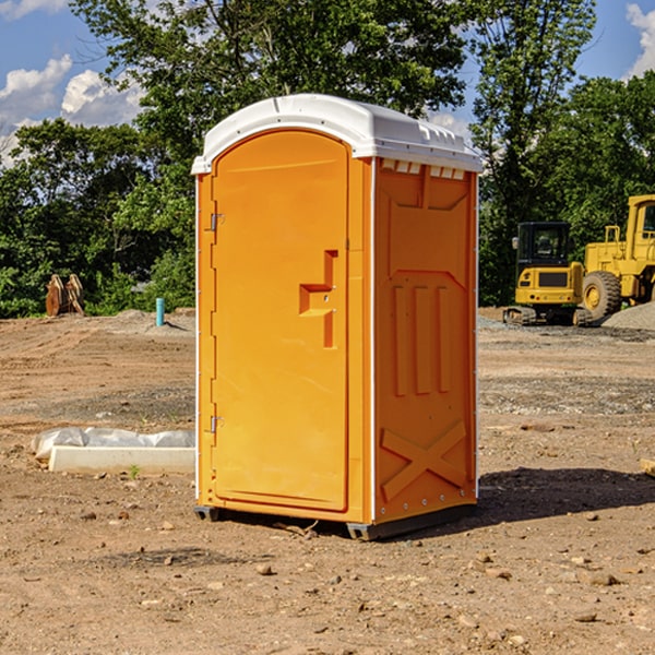 how often are the porta potties cleaned and serviced during a rental period in Phelps